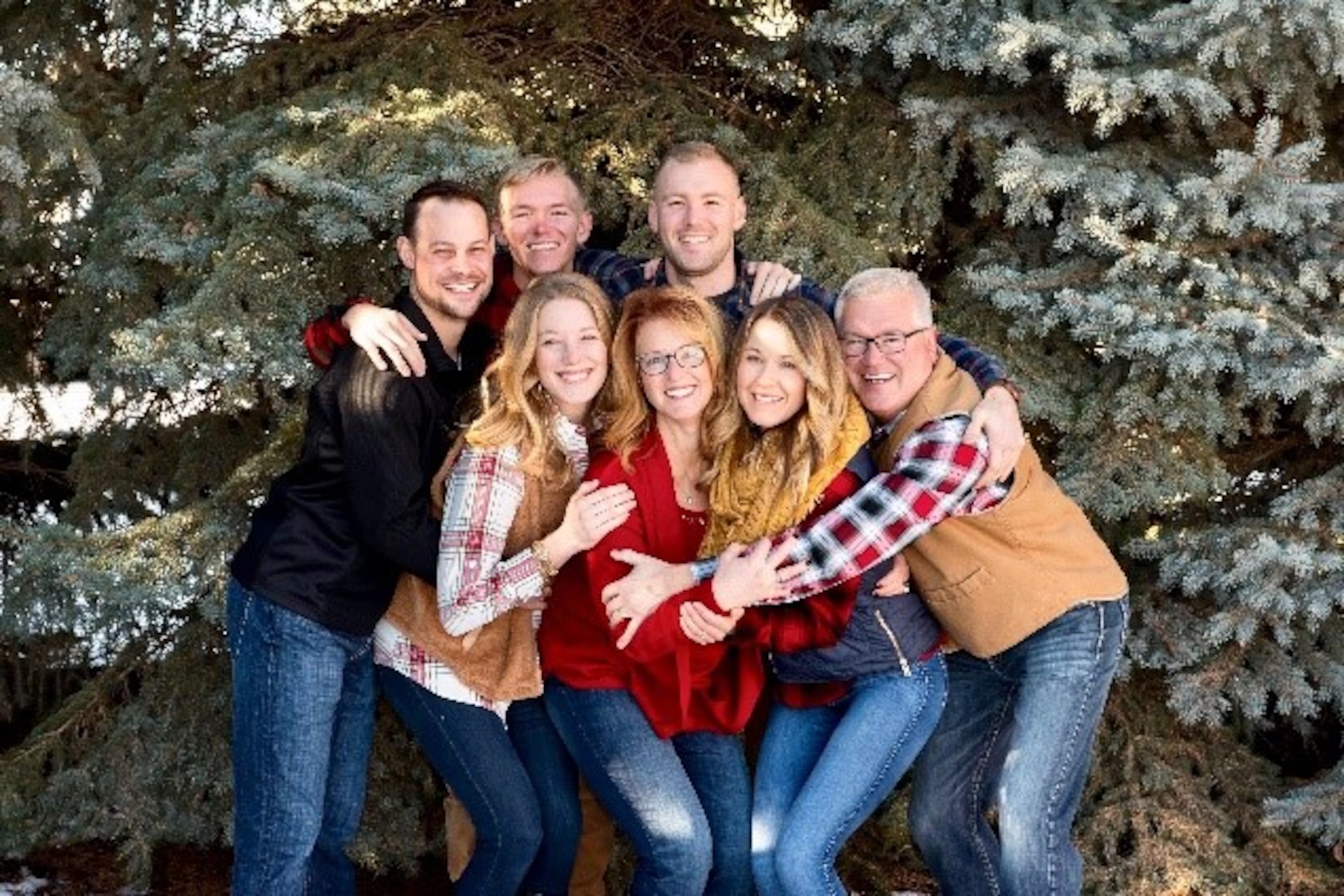 Fink’s immediate family (front row L/R) MaKayla Donahue, his older sister, Rhonda Fink, his mother, Cami Fink his wife, Richard Fink his father, (back row L/R) Marshall Donahue, his brother in-law, Connor Fink his younger brother, and Capt. Fink. (Courtesy photo)