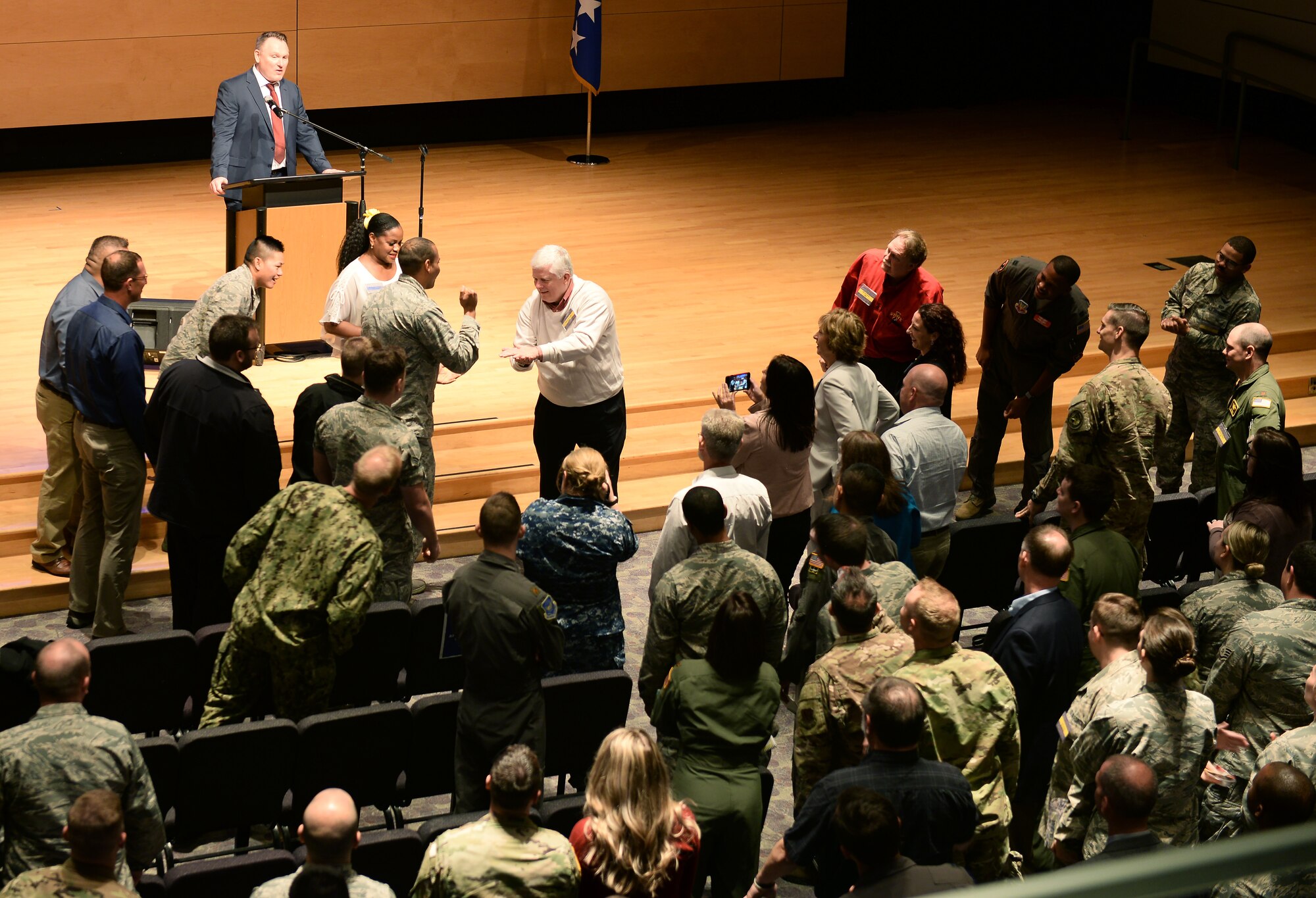 Team Offutt members participate in a rock, paper scissor challenge during the Empowering Tomorrow’s Leaders conference May 14, 2019, at the Salvation Army Kroc Center Omaha, Nebraska. This challenge encouraged comradery among others and to help those around them.