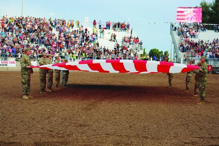 Utah National Guard Soldiers participate in the opening flag ceremony during the Ute Stampede in Nephi, Utah, July 14, 2018