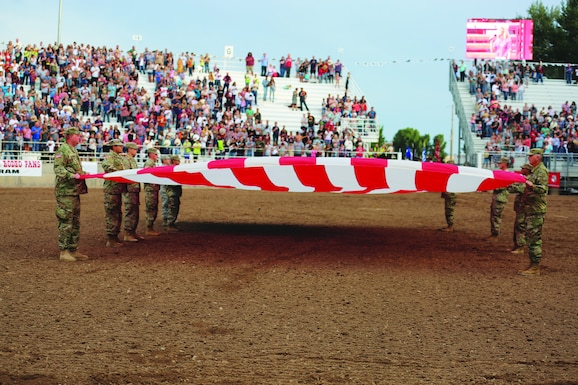 Utah National Guard Soldiers participate in the opening flag ceremony during the Ute Stampede in Nephi, Utah, July 14, 2018