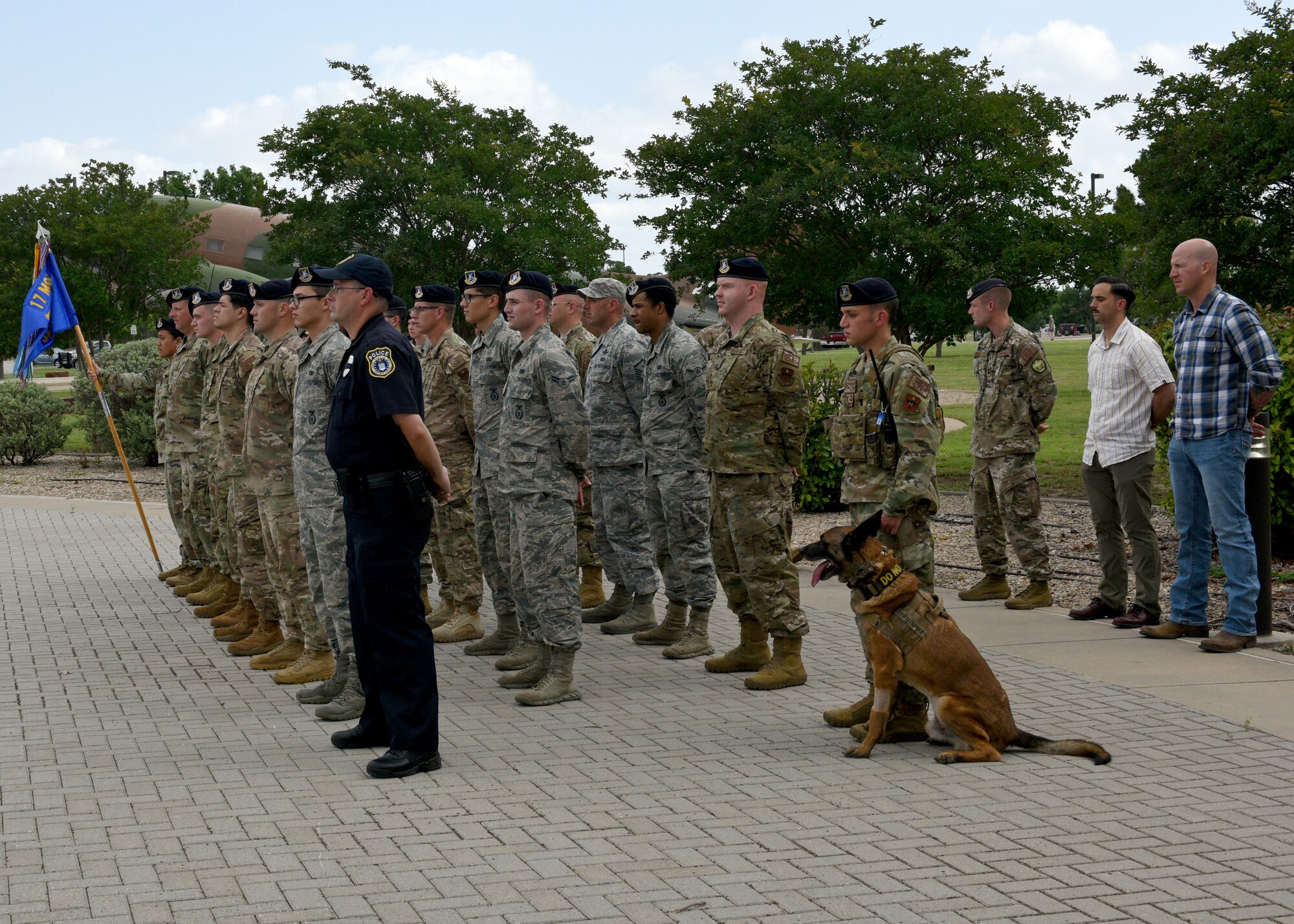 U.S. Air Force 17th Security Forces Squadron prepares for the special Retreat Ceremony on Goodfellow Air Force Base, Texas, May 17, 2019. This ceremony signified the end of Police Week while allowing members to honor the flag and fallen. (U.S. Air Force photo by Airman 1st Class Robyn Hunsinger/released)