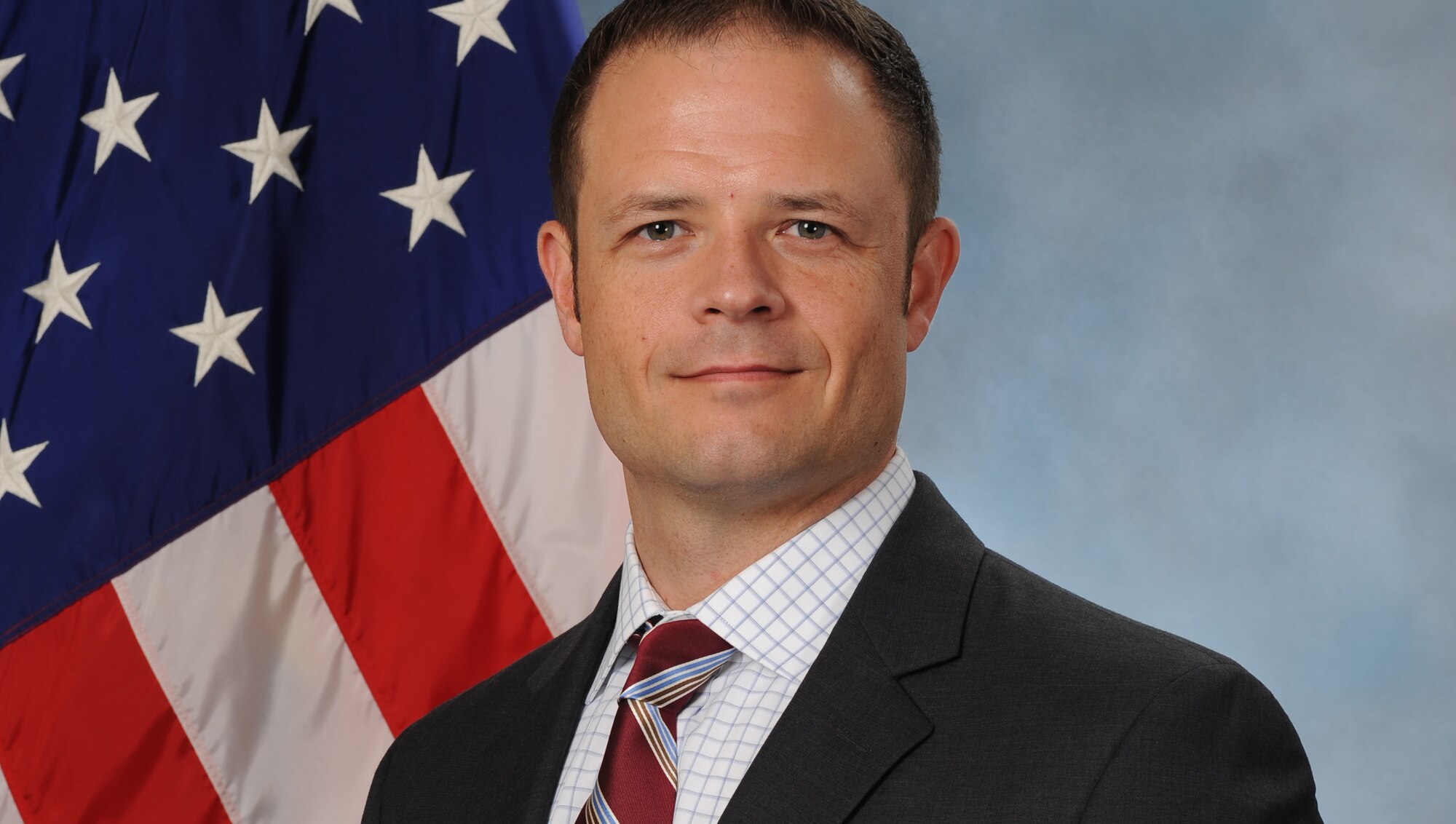 Dr. Troy Hallsell, 341st Missile Wing historian, poses for an official photo, Aug. 2, 2018 at Malmstrom Air Force Base, Mont.