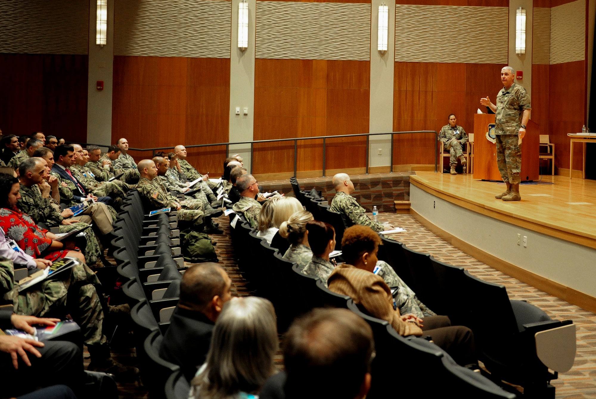 Maj. Gen. Thomas Geary, Defense Intelligence Agency’s Director for Operations, speaks to an audience May 14 in the National Air and Space Intelligence Center at Wright-Patterson Air Force Base, Ohio, during the Joint Reserve Intelligence Program conference. This year’s annual conference was hosted at NASIC with representatives from all 28 Joint Reserve Intelligence Centers nationwide, stakeholders from the combatant commands, and senior leaders from the services and combat support agencies.  The conference focused on stakeholder initiatives and future requirements. (U.S. Air Force photo by Senior Airman Michael Hunsaker)