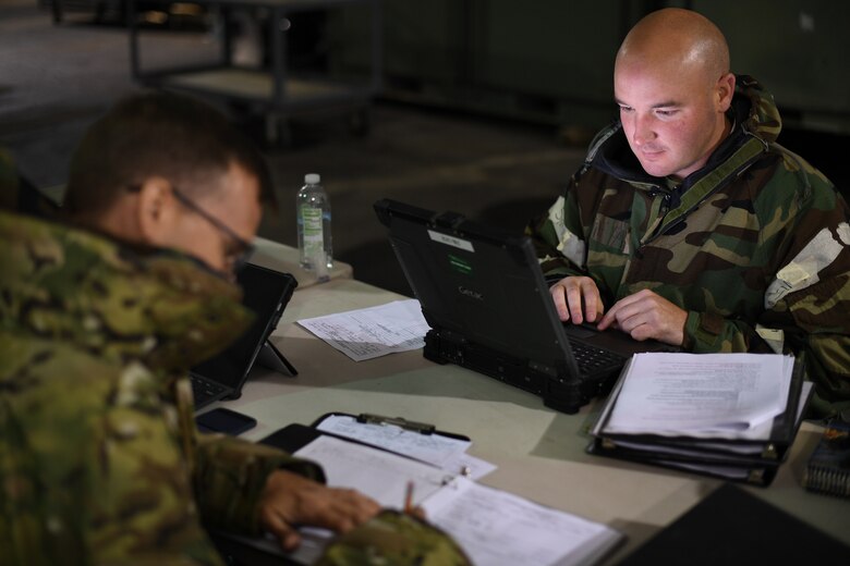 Tech. Sgt. Jacob Benke, 309th Aircraft Maintenance Group Expeditionary Depot Maintnenance, completes documentation forms during an exercise at Hill Air Force Base, Utah, May 21, 2019.