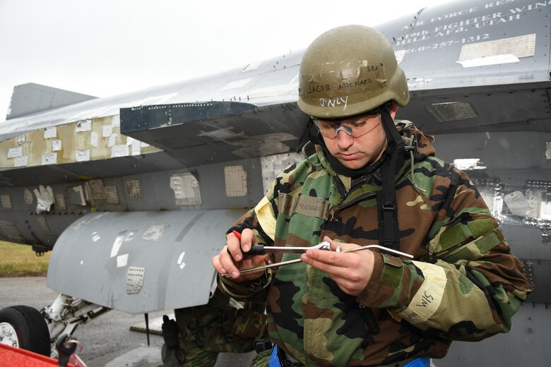 Senior Airman Jacob Michael, 309th Aircraft Maintenance Group Expeditionary Depot Maintnenance, works a pneudraulics repair during an exercise at Hill Air Force Base, Utah, May 21, 2019.