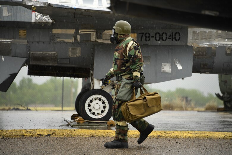A 309th Aircraft Maintenance Group Expeditionary Depot Maintnenance Airman carries a tool bag during an exercise at Hill Air Force Base, Utah, May 21, 2019.