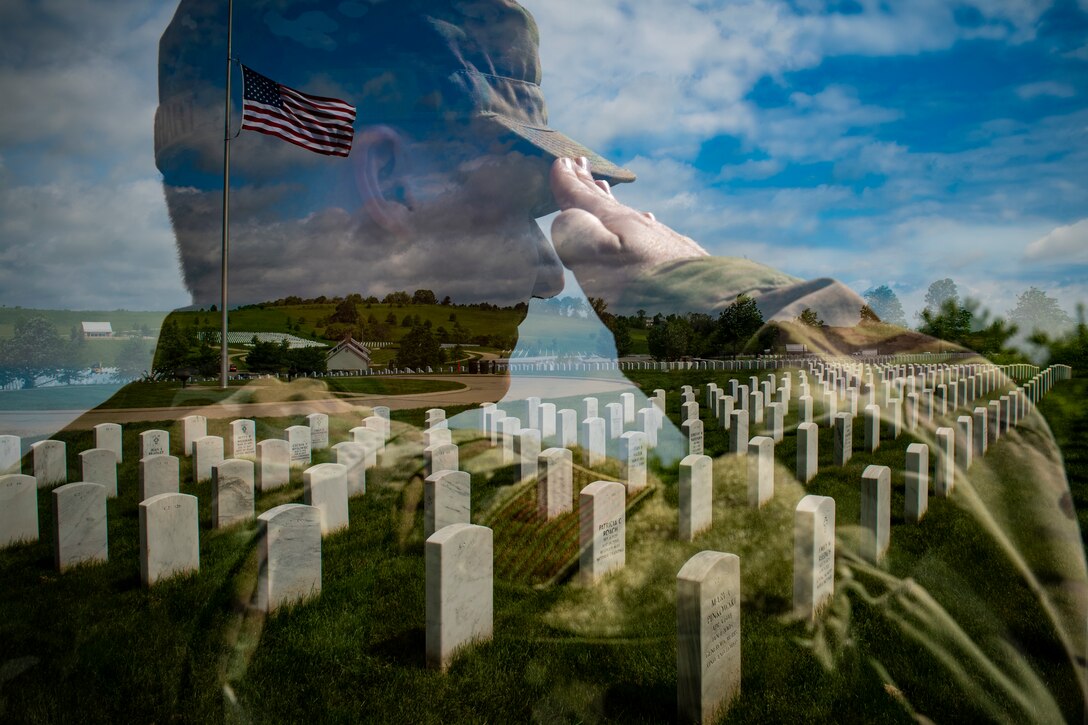 An  airman salutes at a graveyard.