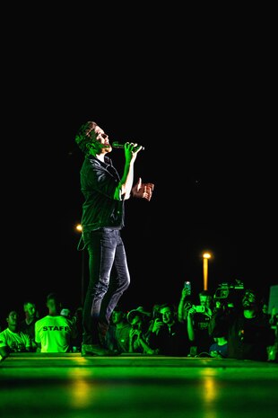 Scotty McCreery, country music artist, performs at the 16th annual We Salute You event on Marine Corps Air Ground Combat Center, Twentynine Palms, Calif., May 18, 2019. The event was hosted by Marine Corps Community Services to show appreciation for service members and their families at the Combat Center. (U.S. Marine Corps photo by Lance Cpl. Colton Brownlee)