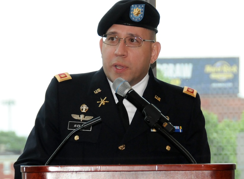 Maj. Vic Aviles, G-3 operations officer for the U.S. Army Reserve’s 99th Readiness Division headquartered on Joint Base McGuire-Dix-Lakehurst, New Jersey, addresses the audience as the Federal Reserve Bank of Philadelphia hosts its third-annual Memorial Day remembrance ceremony May 23 at its headquarters to honor those men and women in uniform who have made the ultimate sacrifice in service to the nation. The Federal Reserve Bank of Philadelphia is one of the 12 regional Reserve Banks that, together with the Board of Governors in Washington, D.C., make up the Federal Reserve System. The institution holds a remembrance ceremony the Thursday before Memorial Day every year.