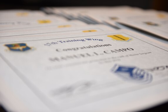 Certificates for Goodfellow’s newest master sergeant selects wait to be presented during the Master Sergeant select ceremony at the event center on Goodfellow Air Force Base, Texas, May 23, 2019. Master sergeants transition from being technical experts and first line supervisors to leaders of operational competence skilled at merging subordinates’ talents, skills, and resources to most effectively accomplish the mission. (U.S. Air Force photo by Senior Airman Seraiah Hines/Released