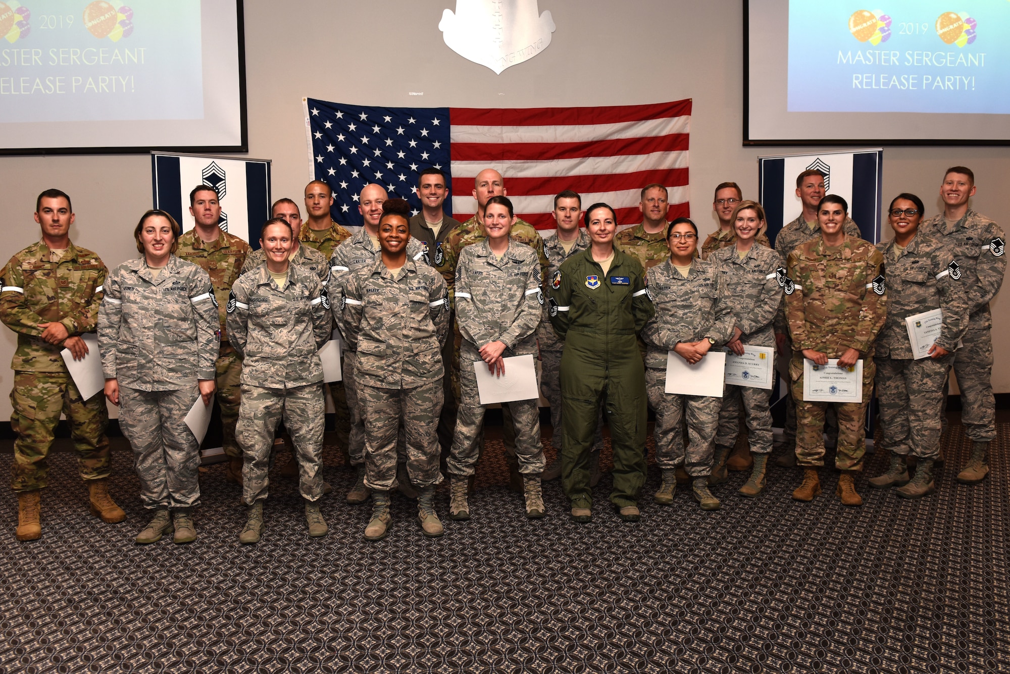 Goodfellow’s newest master sergeant selects gather for a group photo during the Master Sergeant Select Ceremony at the event center on Goodfellow Air Force Base, Texas, May 23, 2019. As senior enlisted leaders, master sergeants must reflect the highest qualities of a leader and professional. (U.S. Air Force photo by Senior Airman Seraiah Hines/Released)
