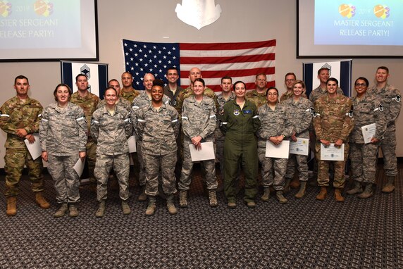 Goodfellow’s newest master sergeant selects gather for a group photo during the Master Sergeant Select Ceremony at the event center on Goodfellow Air Force Base, Texas, May 23, 2019. As senior enlisted leaders, master sergeants must reflect the highest qualities of a leader and professional. (U.S. Air Force photo by Senior Airman Seraiah Hines/Released)