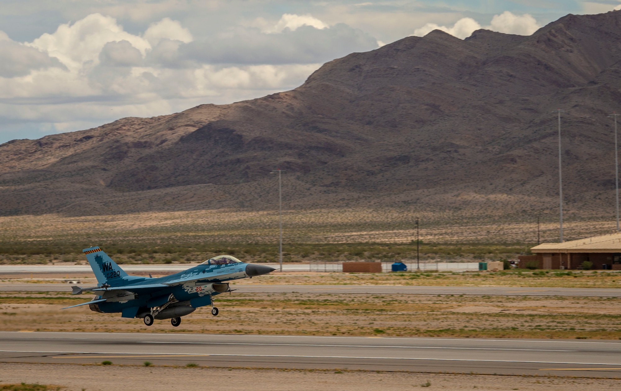 An F-16 Fighting Falcon fighter jet takes off.