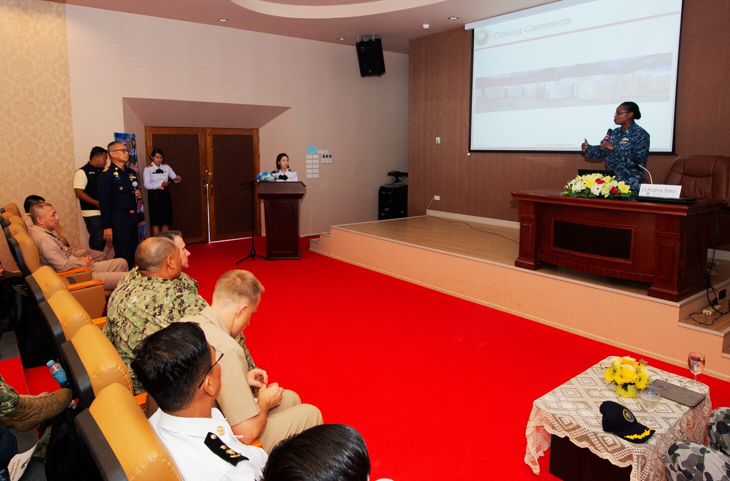 Sattahip, Thailand (May 20, 2019) – U.S. Navy Lt. Andrea Baker, assigned to Pacific Partnership 2019 (PP19), answers questions from PP19 participants following a presentation on humanitarian assistance and disaster relief (HADR) guidelines as part of an HADR knowledge exchange at the Queen Sinikit Hospital. Pacific Partnership, now in its 14th iteration, is the largest annual multinational humanitarian assistance and disaster relief preparedness mission conducted in the Indo-Pacific. Each year the mission team works collectively with host and partner nations to enhance regional interoperability and disaster response capabilities, increase security and stability in the region, and foster new and enduring friendships in the Indo-Pacific.