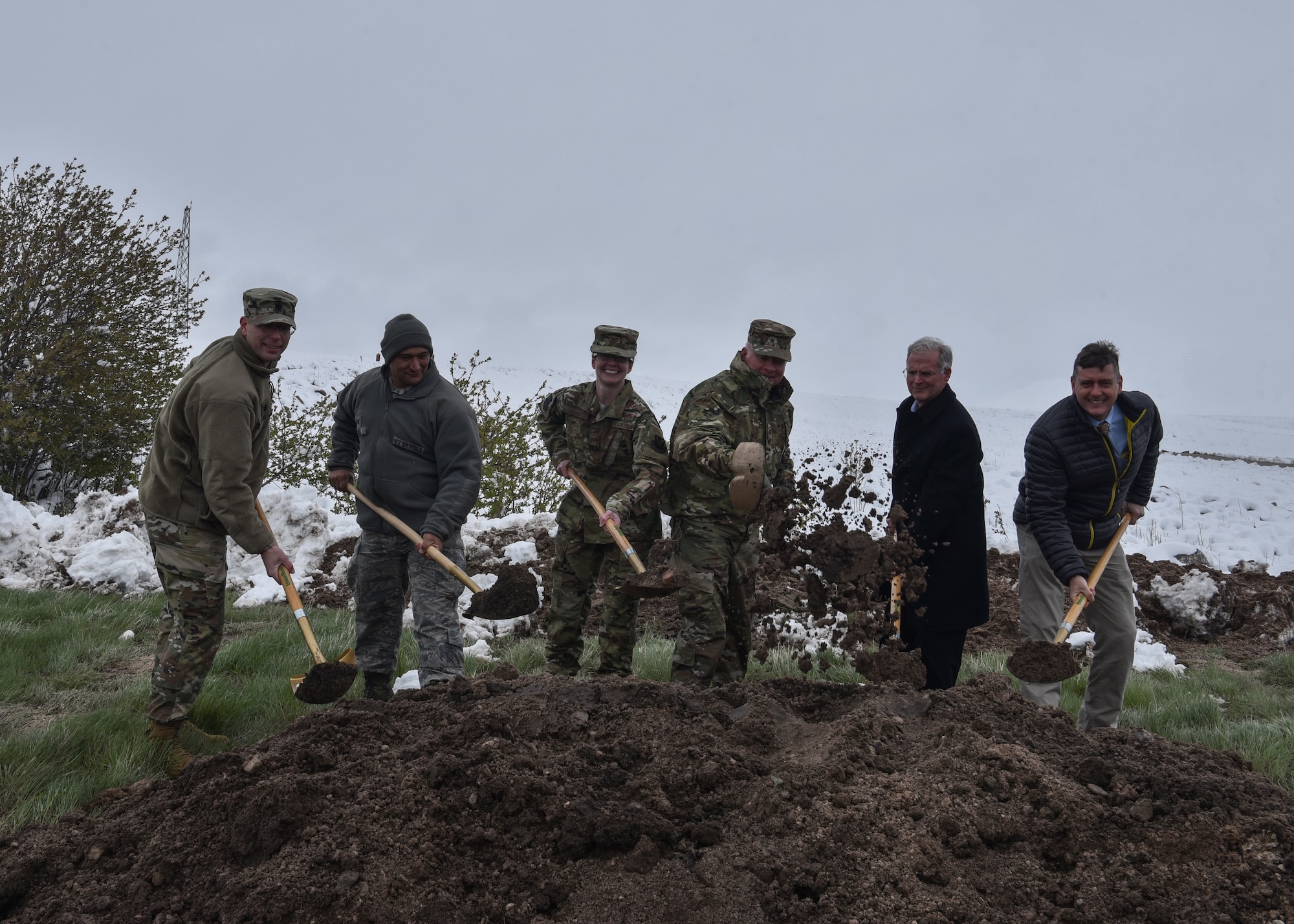 Major General Fred Stoss, 20th Air Force commander, 90th Missile Wing leadership and representative from the Army Corps of Engineers break ground for the new weapons generation facility, May 21, 2019, on F.E. Warren Air Force Base, Wyo. Groundbreaking is a cultural ceremony to represent the first official day of a construction project. (U.S. Air Force photo by Airman 1st Class Braydon Williams)