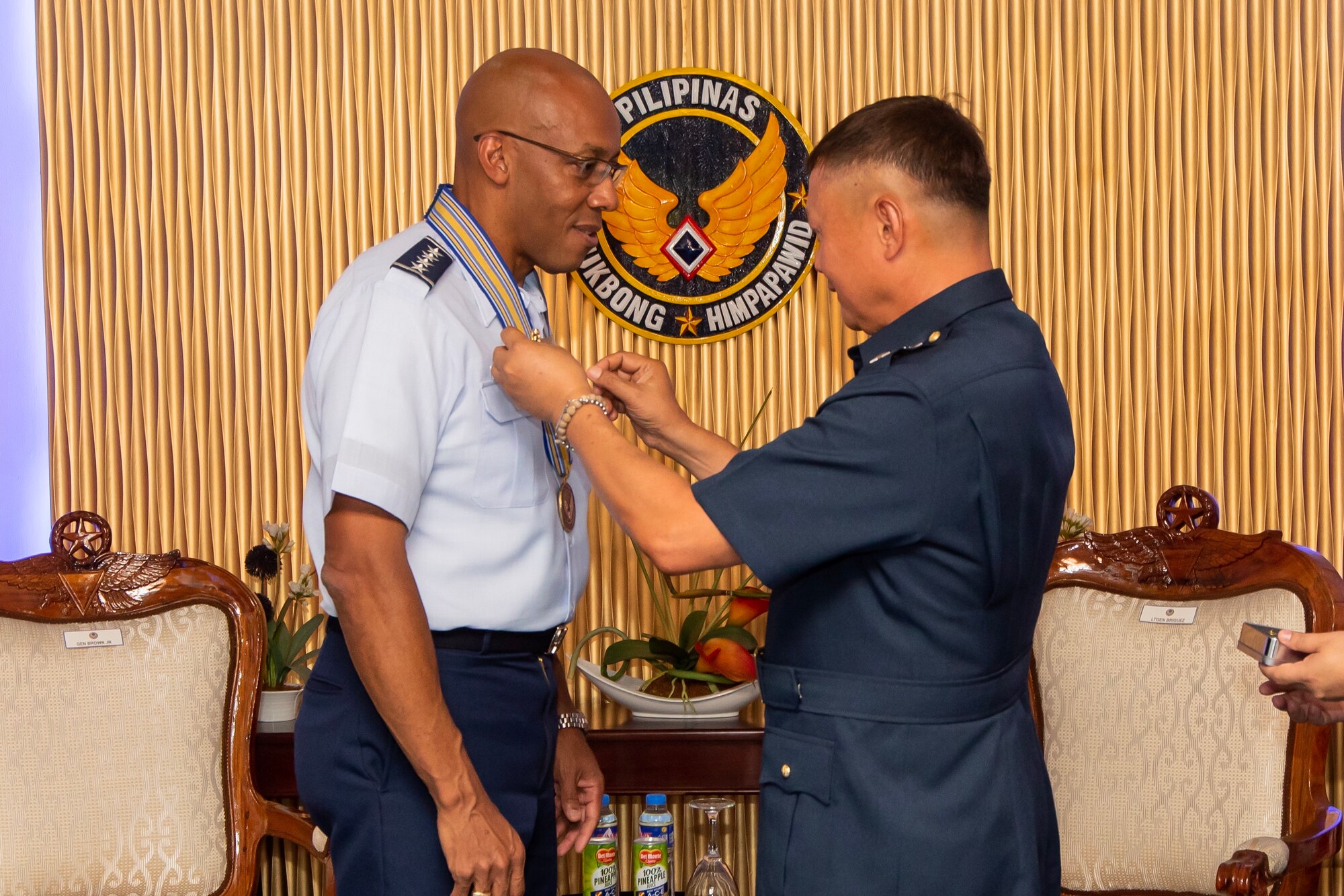 Gen. CQ Brown, Jr., Pacific Air Forces commander, is awarded with honorary Gold Wings from Philippines Air Force Commanding General Lt. Gen. Rozzano Briguez at Villamor Air Base, Philippines, May 16, 2019. The 10-carat command pilot wing symbolizes the highest state of military flying professionalism and dedication. Brown, along with Chief Master Sgt. Anthony Johnson, PACAF command chief, visited the country to demonstrate the United States’ shared commitment to peace and security in the region, as well as seek opportunities to enhance interoperability and capability with the PAF.