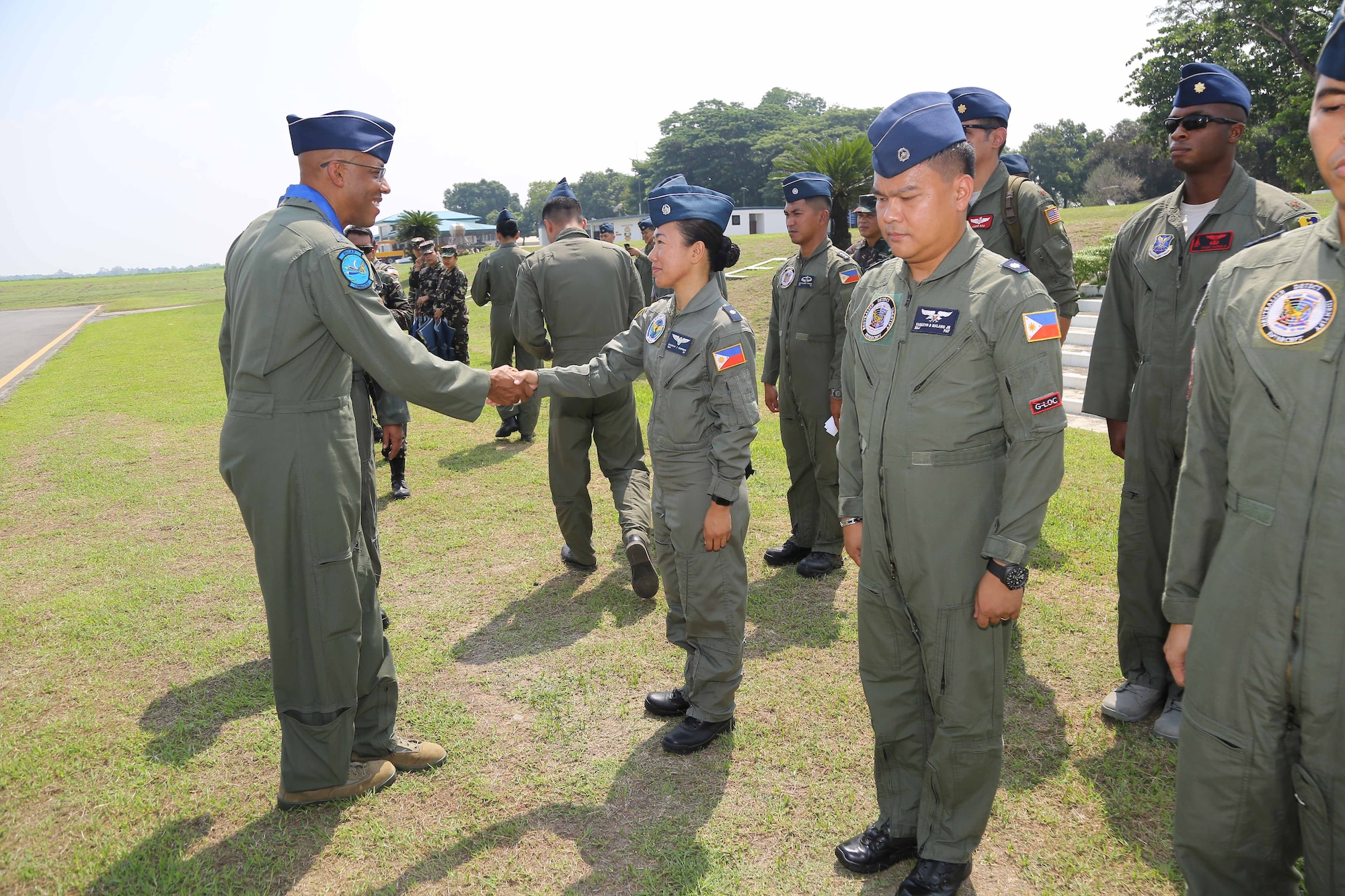 Gen. CQ Brown, Jr., Pacific Air Forces commander, greets Philippines Air Force airmen at Basa Air Base May 17 as part of a three-day visit to the Philippines. Brown, along with Chief Master Sgt. Anthony Johnson, PACAF command chief, visited the country to demonstrate the United States’ shared commitment to peace and security in the region, as well as seek opportunities to enhance interoperability and capability with the PAF.
