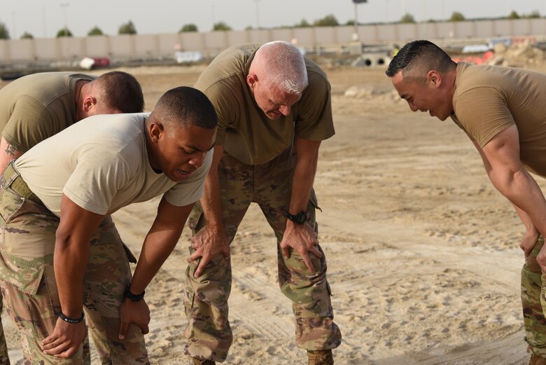 A security forces fire team recite the Airman’s Creed as the final event of the Police Week 2019 fire team challenge May 12, 2019, at Al Dhafra Air Base, United Arab Emirates.