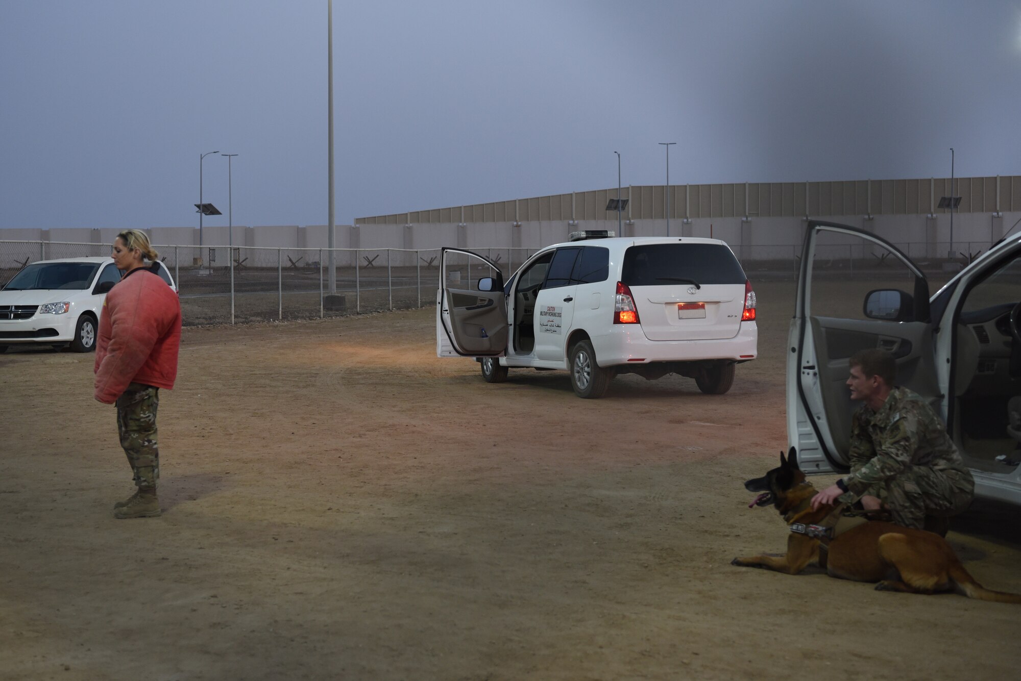 Military working dog handlers demonstrate the abilities of the K-9 unit during Police Week 2019, May 13, 2019, at Al Dhafra Air Base, United Arab Emirates.