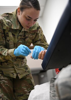 U.S. Air Force Staff Sgt. Kelley McLean, 104th Medical Group aerospace medical technician, performs a DNA test at Barnes Air National Guard Base, Massachusetts, May 18, 2019. McLean recently received her Community College of the Air Force degree in Aerospace Medicine after taking classes at Holyoke Community College. (U.S. Air National Guard photo by Airman 1st Class Randy Burlingame)