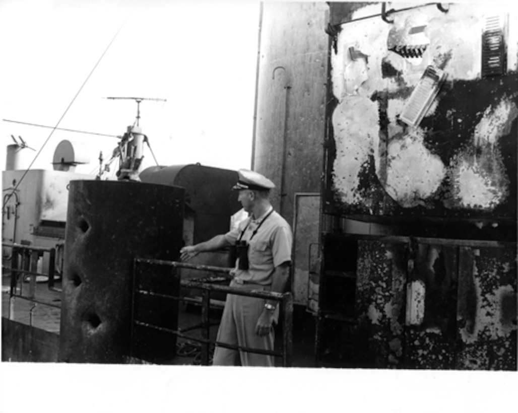 CDR McGonagle Surveys Damage