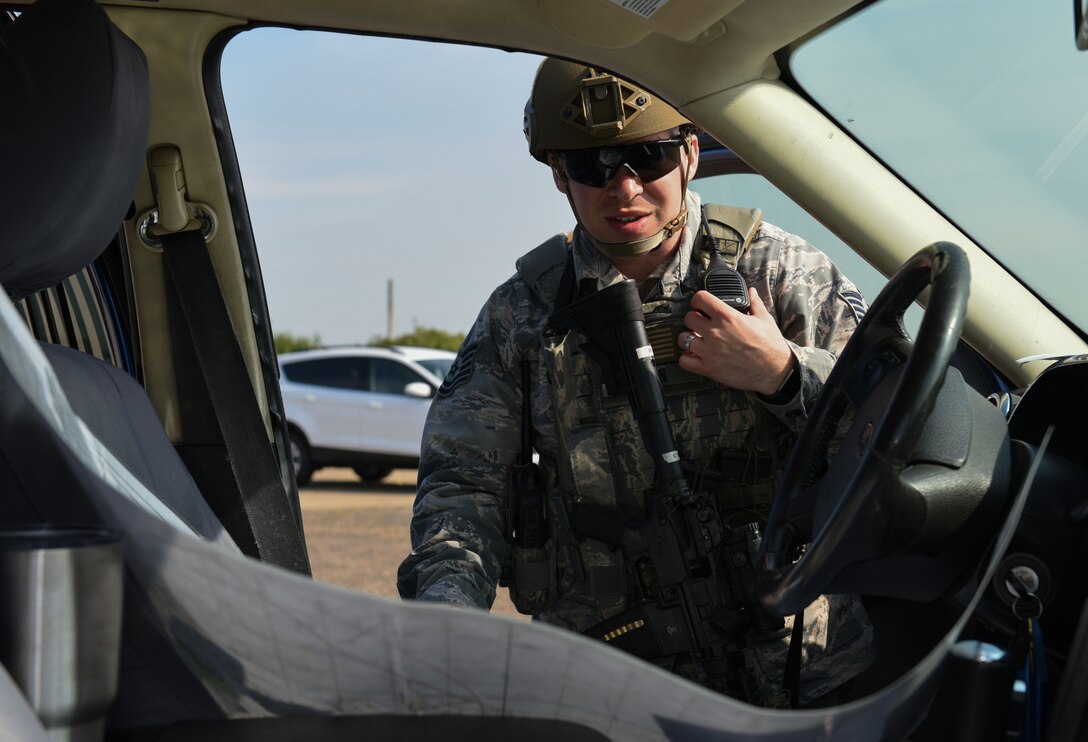 U.S. Air Force Tech. Sgt. Ian Ginn, 423rd Security Forces Squadron NCOIC of physical security, responds to a simulated attacker threat during a preparedness exercise at RAF Alconbury, England, May 20, 2019. The exercise tested the 501st Combat Support Wing preparedness and response capabilities to an emergency situation. (U.S. Air Force photo by Airman 1st Class Jennifer Zima)