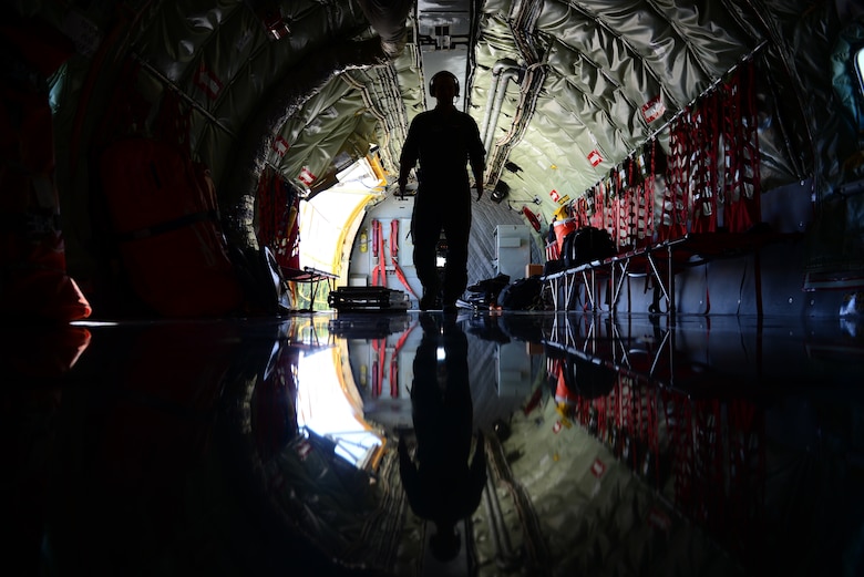 A boom operator walks through a KC-135R Stratotanker