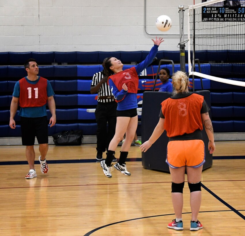The commander of the 932nd Airlift Wing Logistics Flight, Capt. James Harbison, watches Senior Airman Katie Baskerville, 932nd Force Support Squadron, hit the volleyball back to the opposing team during intense league intramural competition May 16, 2019, at Scott Air Force Base, Ill.

"My thoughts about this year’s volleyball team is this: It doesn’t matter about the wins or the losses. What matters is that we all have fun and as cliché as that may sound it’s why we play and continue to do so," said Baskerville.  (U.S. Air Force photo by Lt. Col. Stan Paregien)