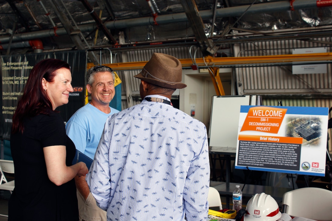 U.S. Army Corps of Engineers Project Manager Brenda Barber and Radiological Health Physicist Hans Honerlah speak with a civilian attendee at the U.S. Army Aviation Brigade's Safety Stand Down at Davison Army Airfield about the ongoing planning for the final decommissioning and dismantling of the Deactivated SM-1 Nuclear Power Plant at Fort Belvoir Thursday May 23, 2019. The SM-1 project team participated in the event as part of ongoing outreach efforts to inform members of the Fort Belvoir community about the SM-1 project, help create an understanding of the nature of the project and address potential concerns. More information about the SM-1 project is available online at www.nab.usace.army.mil/SM-1