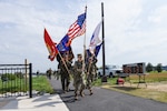 Members of the Defense Intelligence Agency’s color guard cross the finish line at the 2019 Team JBAB Memorial March, on Joint Base Anacostia-Bolling, Washington, D.C., May 23.