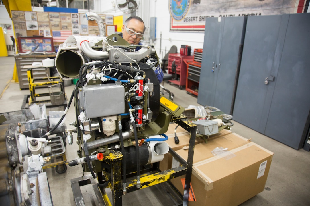 Daniel Madrid works on the Auxiliary Power Unit for the HERCULES M-88 tank retriever, May 16. His knowledge of the programs and systems involving engines and transmissions make him a valued member of the workforce. Madrid started working at Marine Corps Logistics Base Barstow, Calif., in 1969. Five decades later he has seen many changes at Production Plant Barstow, Marine Depot Maintenance Command, aboard the Yermo Annex of MCLBB.