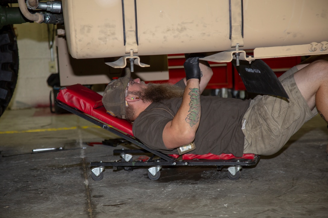 Ryan Haverlock, Heavy Equipment Mechanic, reassembles components on a Logistics Vehicle System Replacement at the Motor Transportation Branch at Production Plant Barstow, Marine Depot Maintenance Command, on the Yermo Annex aboard Marine Corps Logistics Base Barstow, Calif., May 7.
