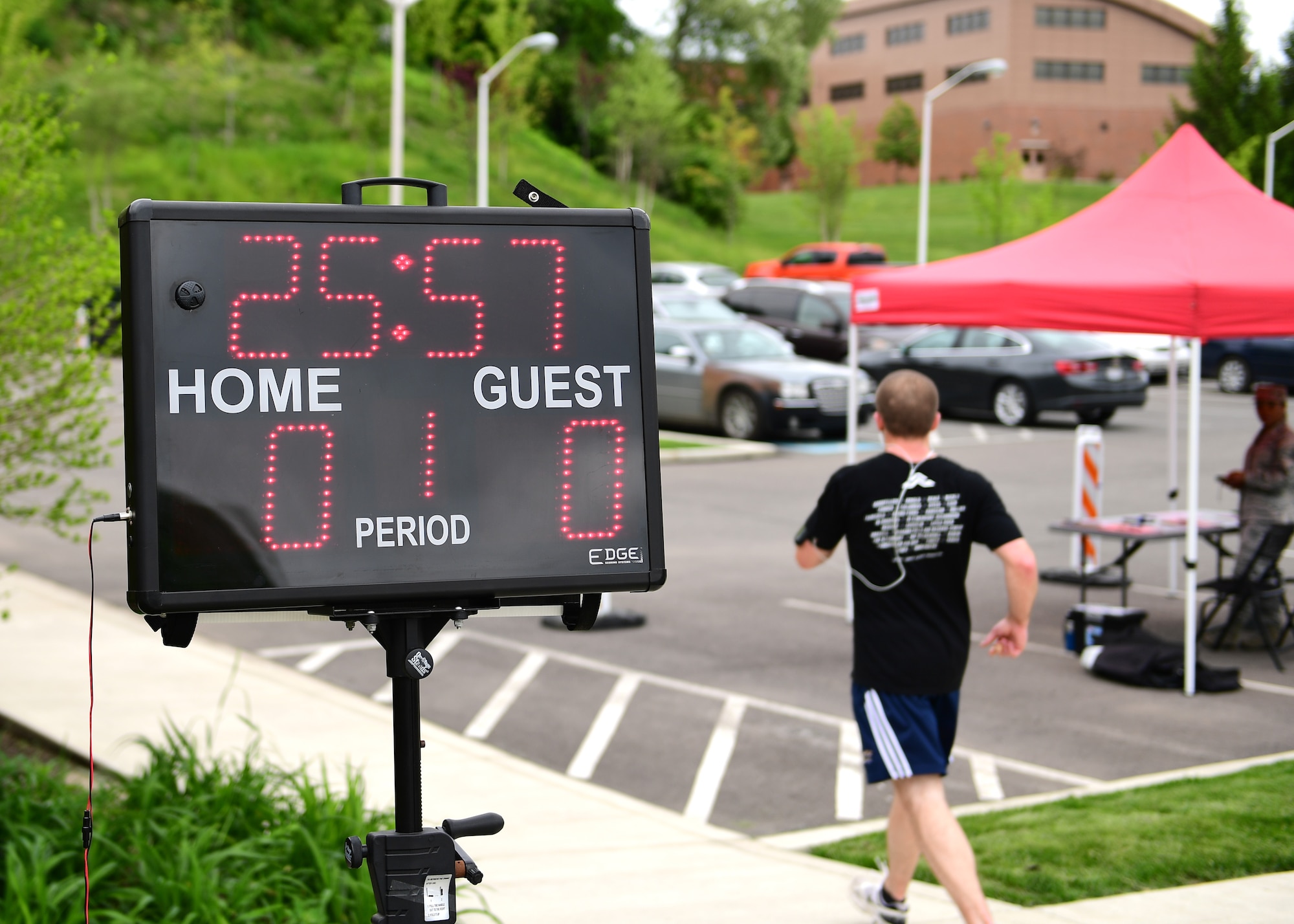 Jeffrey Stearns, 911th Airlift Wing exercise physiologist, finishes the Ruck, Run, Walk at the Pittsburgh International Airport Air Reserve Station, Pennsylvania, May 17, 2019. Stearns was the first to finish the five-kilometer run with a time under 26 minutes. (U.S. Air Force photo by Senior Airman Grace Thomson)