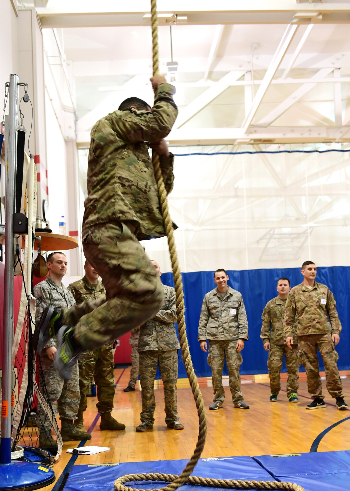 Staff Sgt. James Krobot, 911th Maintenance Squadron sheet metal technician, climbs a rope at the Pittsburgh International Airport Air Reserve Station, Pennsylvania, May 4, 2019. This was a timed rope climb for the Combat Air Assault School tryouts to determine the candidates’ eligibility for further training. (U.S. Air Force photo by Senior Airman Grace Thomson)