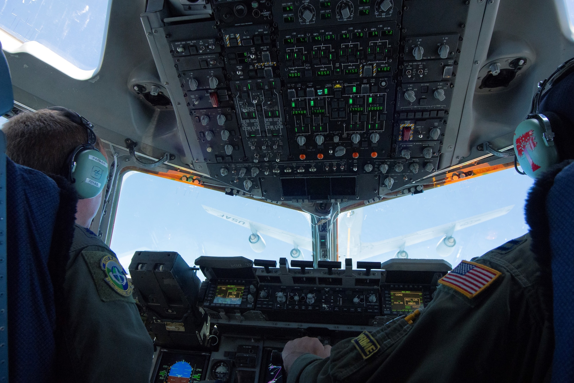 Lt. Col. Mike Parker and Capt. Mike Mothena, 315th Airlift Wing, prepare their C-17 Globemaster III to receive fuel from a KC-135R Stratotanker from the 459th Air Refueling Wing, Joint Base Andrews, Md. May 21.