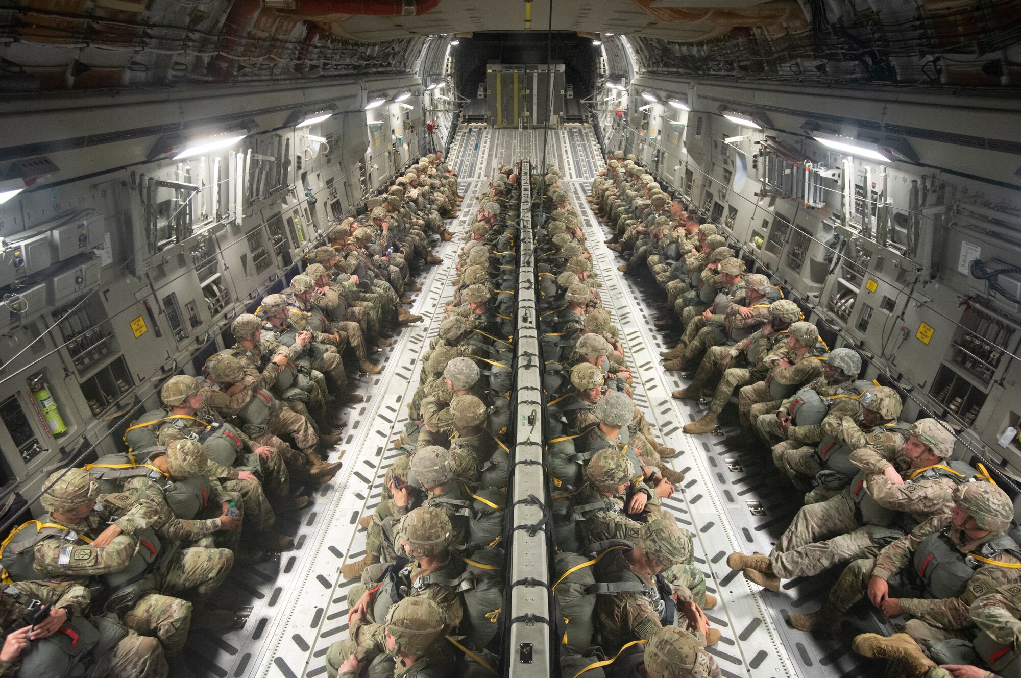 Soldiers of the 82nd Airborne Division prepare to jump out of a Charleston-based C-17 Globemaster III aircraft during the Palmetto Challenge Exercise May 23 near Pope Field, North Carolina.