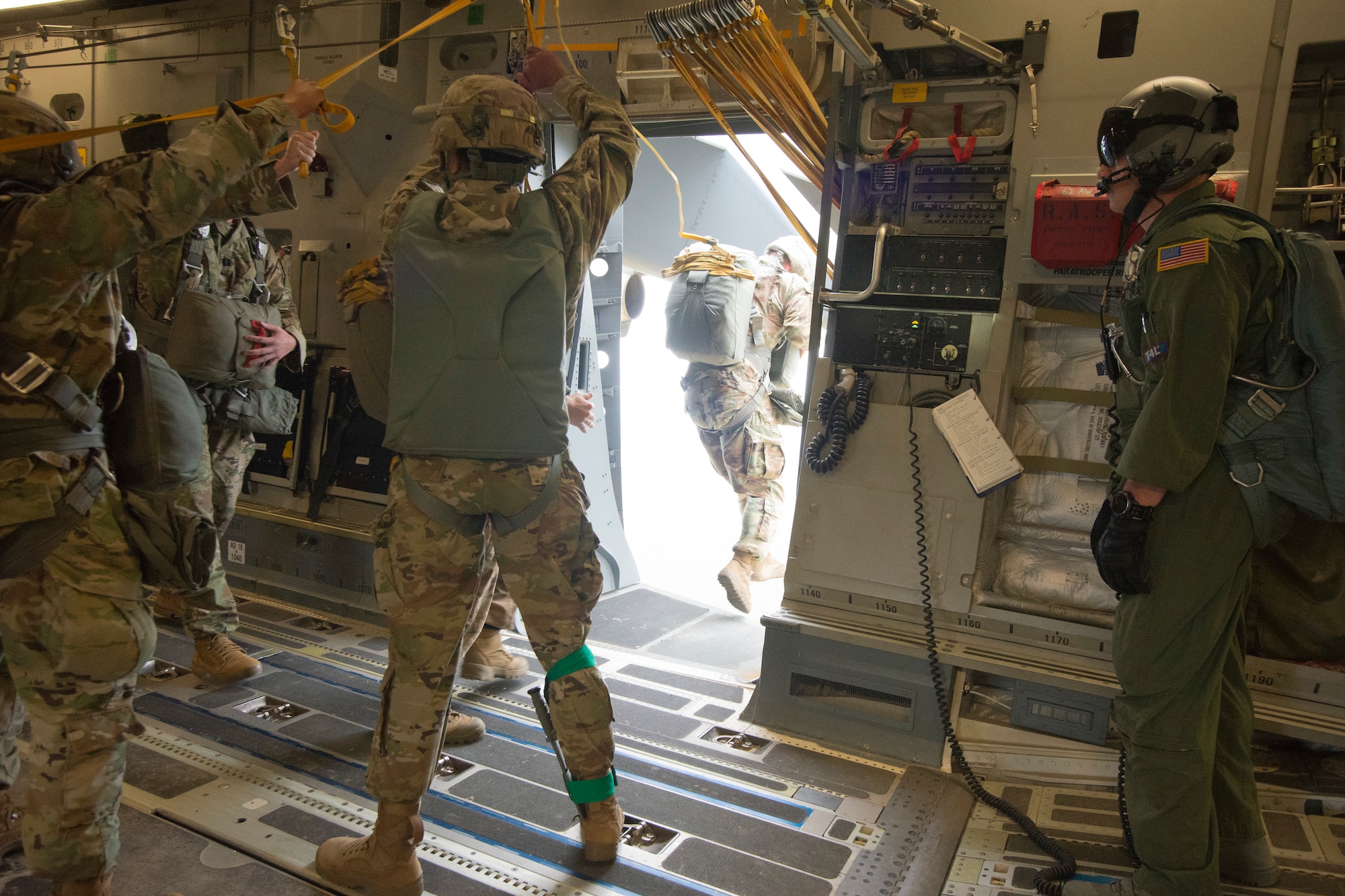 A Soldier assigned to the 82nd Airborne Division jumps out of a Charleston-based C-17 Globemaster III during All American Week May 23 near Fort Bragg, North Carolina.