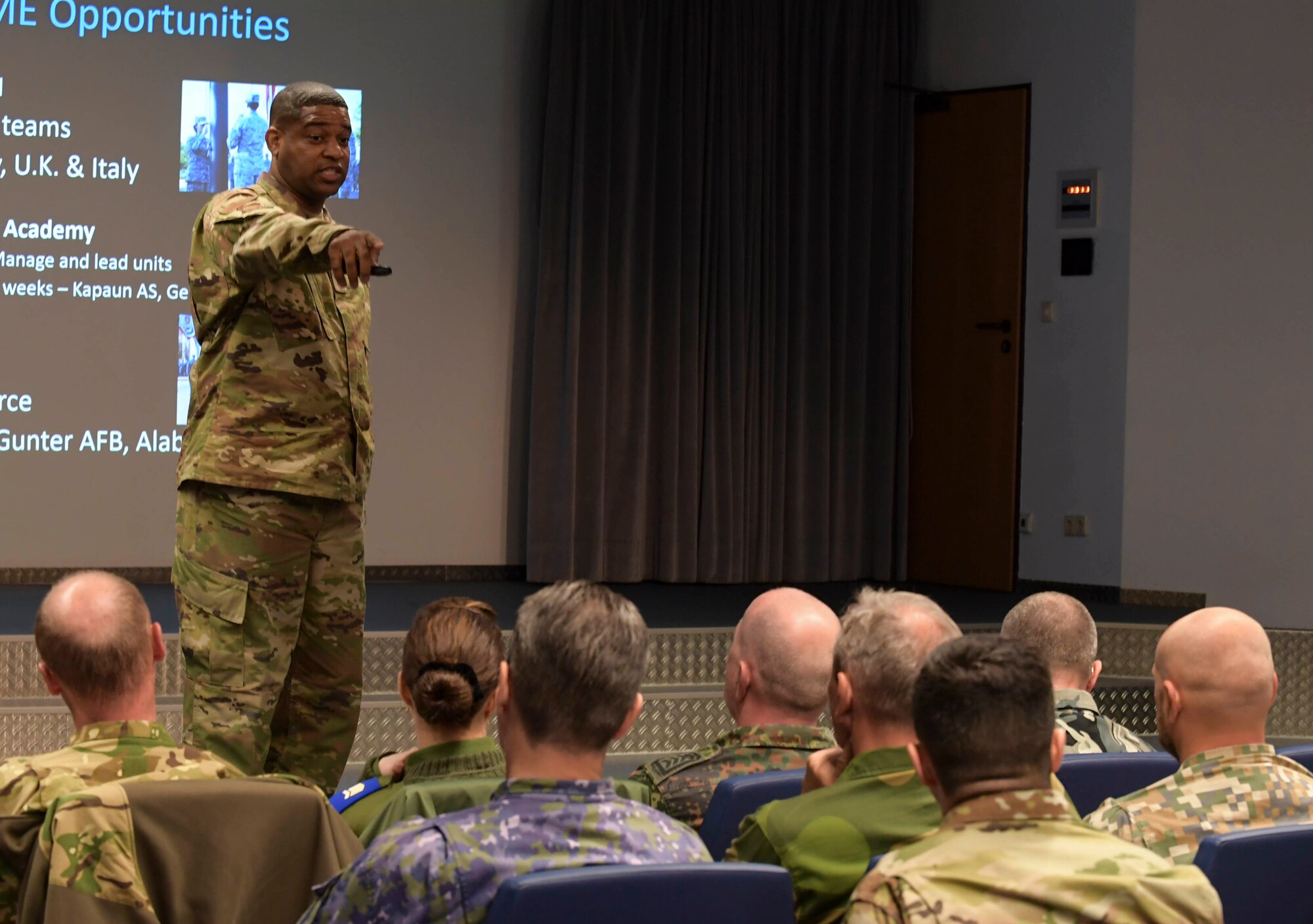 Chief Master Sgt. Phillip Easton, U.S. Air Forces Europe - Air Forces Africa command chief, gives a brief during the first European Air Forces Senior Enlisted Conference at Kisling NCO Academy, at Kapaun Air Station, Germany, May 21, 2019. Participants from 19 countries, including the United States, discussed multiple topics to help enhance personal growth, increase interoperability, and build partnership capacity. (U.S. Navy photo by Mass Communication Specialist 2nd Class Deanna C. Gonzales)