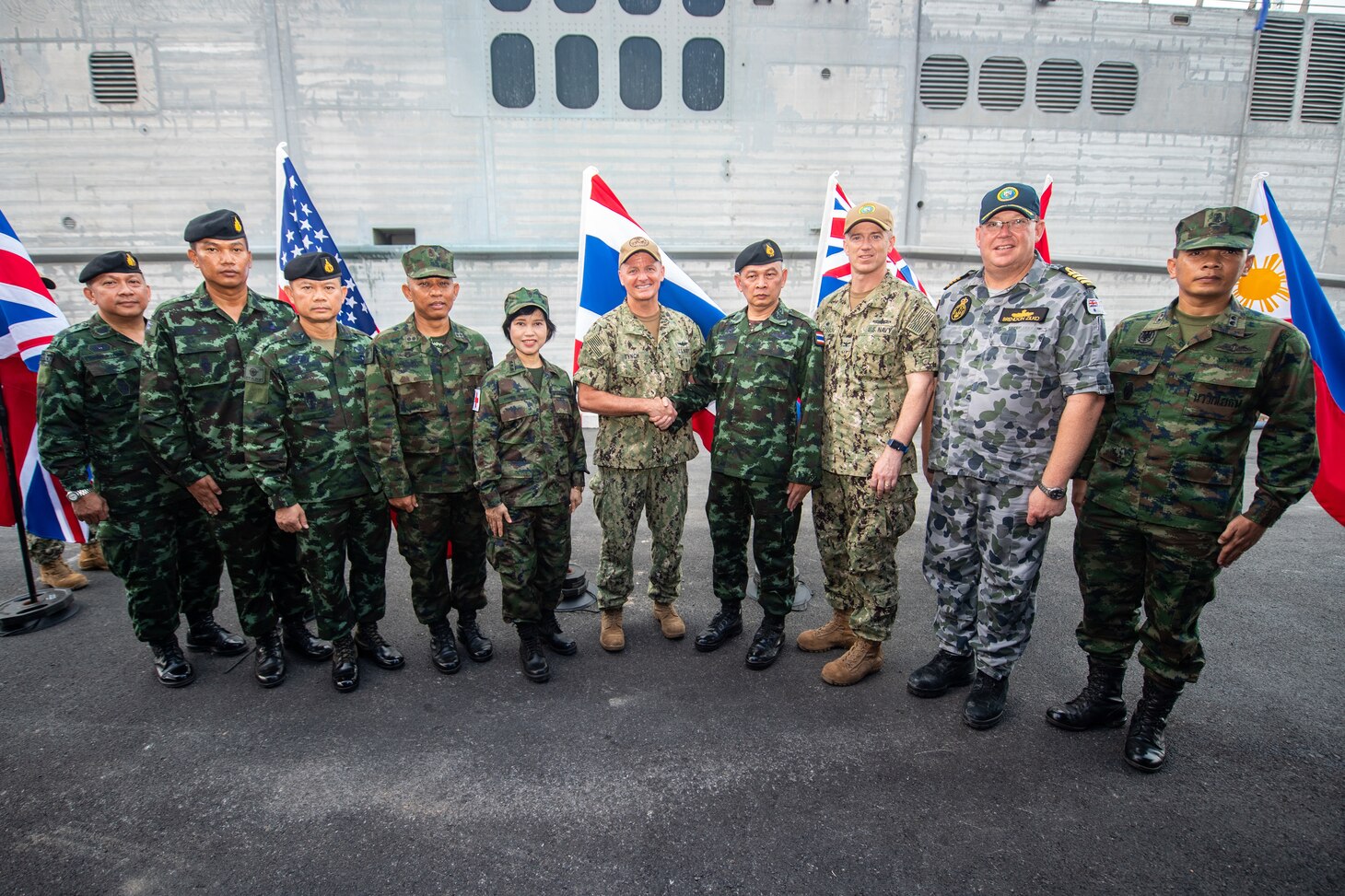 190525-N-AZ808-2094

SATTAHIP, Thailand (May 25, 2019) – Distinguished guests pose for a group photo following the Pacific Partnership 2019 (PP19) closing ceremony for Thailand. Thailand is the final mission stop for PP19. Pacific Partnership, now in its 14th iteration, is the largest annual multinational humanitarian assistance and disaster relief preparedness mission conducted in the Indo-Pacific. Each year the mission team works collectively with host and partner nations to enhance regional interoperability and disaster response capabilities, increase security and stability in the region, and foster new and enduring friendships in the Indo-Pacific.