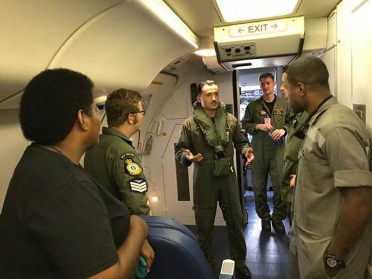 Nadi, FIJI (May 22, 2019) Naval Aircrewman (Operator) Richard JohnsonLee assigned to the “Fighting Tigers” of Patrol Squadron (VP) 8, gives a passenger brief to members of the Republic of Fiji Military Forces and Royal Australian Navy. VP-8 is deployed to the U.S. 7th Fleet (C7F) area of operations conducting maritime patrol and reconnaissance operations in support of Commander, Task Force 72, C7F, and U.S. Indo-Pacific Command objectives throughout the Indo-Pacific region.