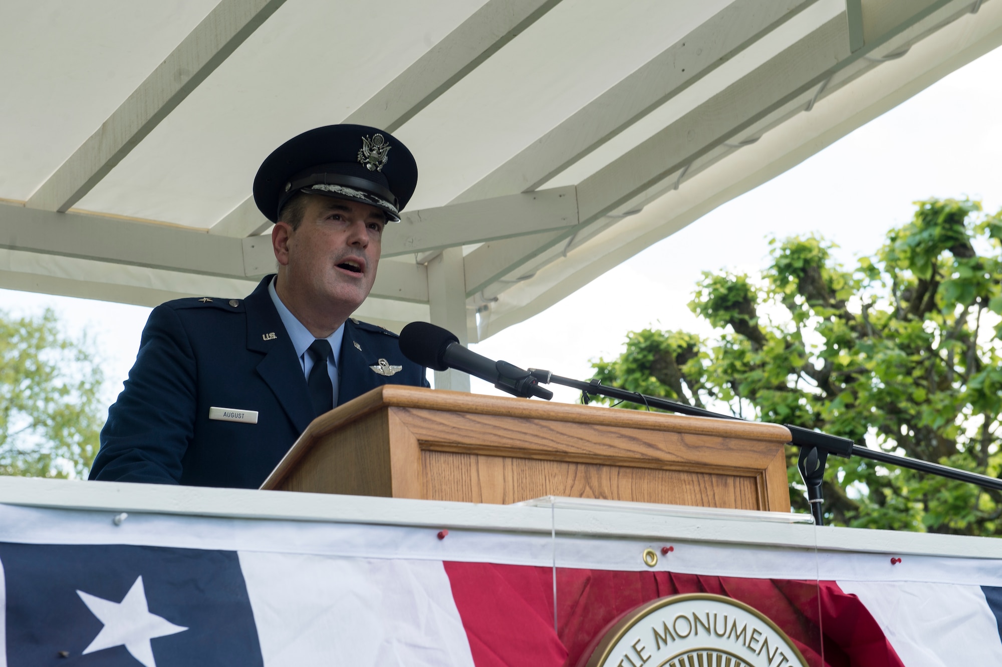 U.S. Air Force Brig. Gen. Mark R. August, 86th Airlift Wing commander, speaks to attendees of a Memorial Day ceremony at the Saint-Mihiel American Cemetery, Thiaucourt-Regniéville, France, May 26, 2019. August spoke of the history of Memorial Day and importance of remembering those who perished. (U.S. Air Force photo by Staff Sgt. Jonathan Bass)