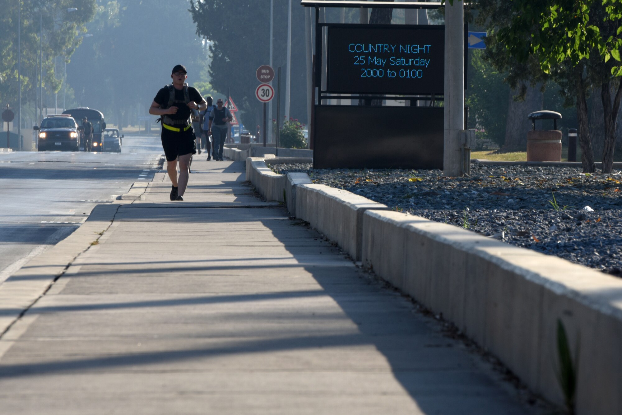 An Airman running during the Memorial Day Ruck March.