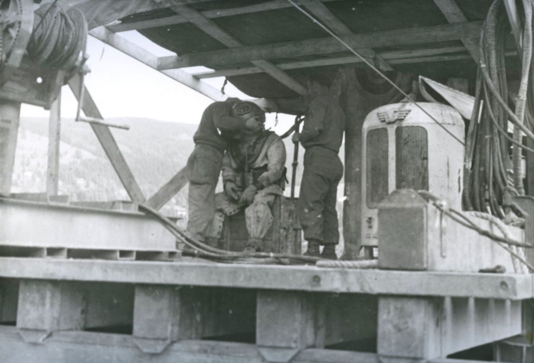 U.S. Army Engineers conduct diving operations to recover Nazi cryptologic records from Lake Schlersee in Southern Germany at the end of World War II