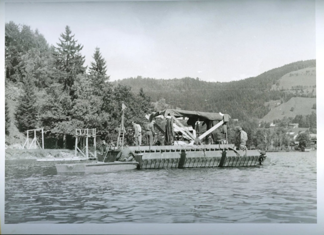 U.S. Army Engineers conduct diving operations to recover Nazi cryptologic records from Lake Schlersee in Southern Germany at the end of World War II