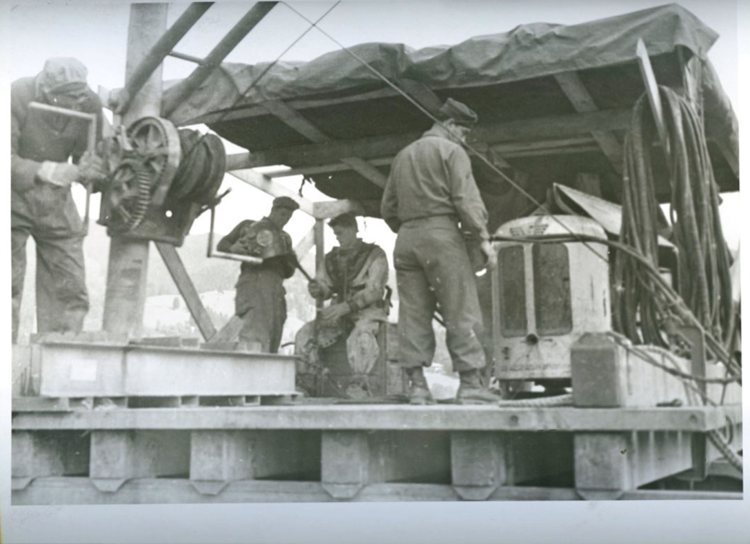 U.S. Army Engineers conduct diving operations to recover Nazi cryptologic records from Lake Schlersee in Southern Germany at the end of World War II