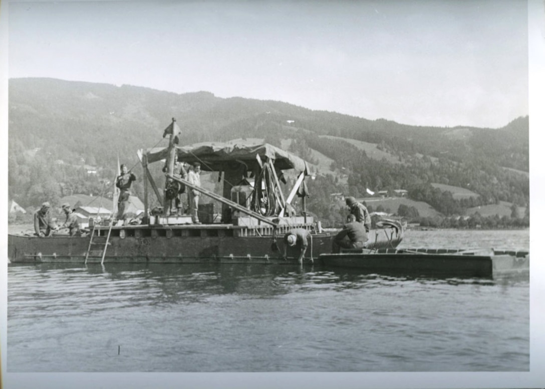 U.S. Army Engineers conduct diving operations to recover Nazi cryptologic records from Lake Schlersee in Southern Germany at the end of World War II