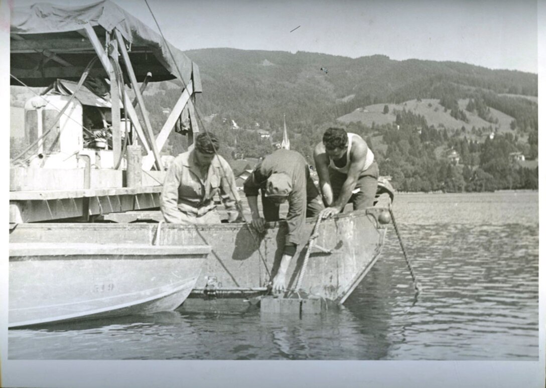 U.S. Army Engineers conduct diving operations to recover Nazi cryptologic records from Lake Schlersee in Southern Germany at the end of World War II