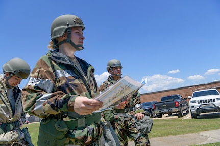 Senior Airman Marianne Frye, an aerial porter assigned to the 437th Aerial Port Squadron, maps out unexploded ordnance locations during a personnel accountability report after a simulated attack during exercise Palmetto Challenge, May 21, 2019, at Joint National Guard Base McEntire, S.C.