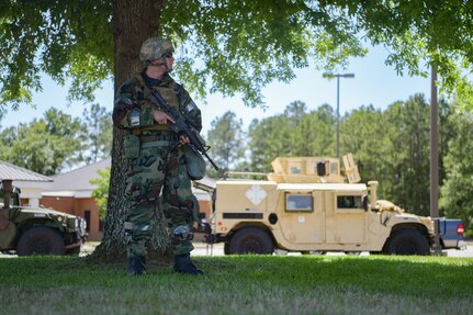 Staff Sgt. Matthew Guggenbiller, a patrolman assigned to the 628th Security Forces Squadron, helps establish a perimeter during exercise Palmetto Challenge May 21, 2019, at McEntire Air National Guard Base, S.C.