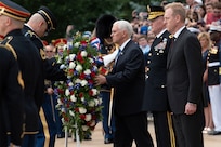 Vice President Mike Pence lays a wreath at the Tomb of the Unknown Soldier with Acting Defense Secretary Patrick M. Shanahan and Army Maj. Gen. Michael L. Howard at Arlington National Cemetery, Va., May 27, 2019.